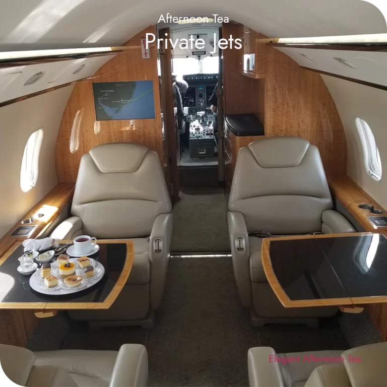 Afternoon tea served aboard a private jet with curated bites arranged for in-flight dining.