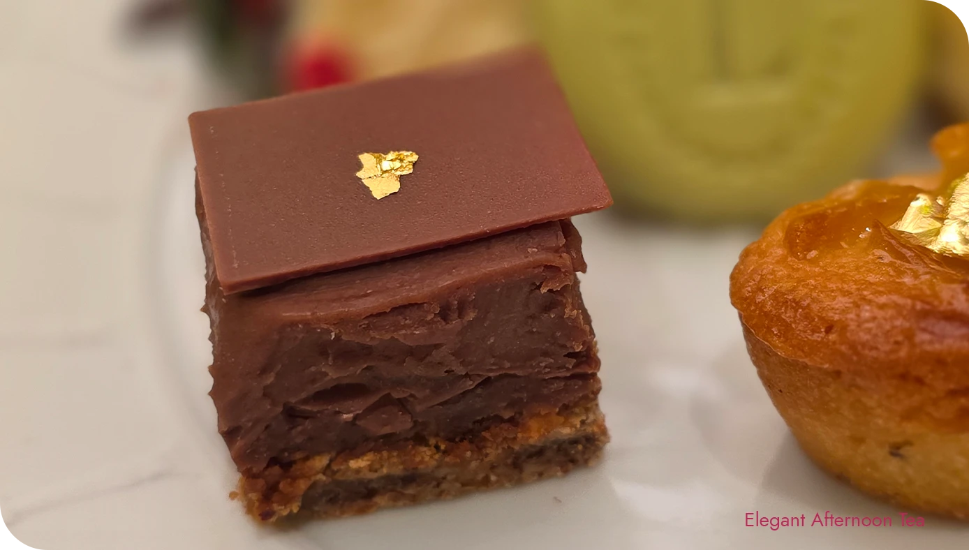 Ladurée Plaisir Sucré dacquoise cake served as part of the Lady Astor’s Tea sweets