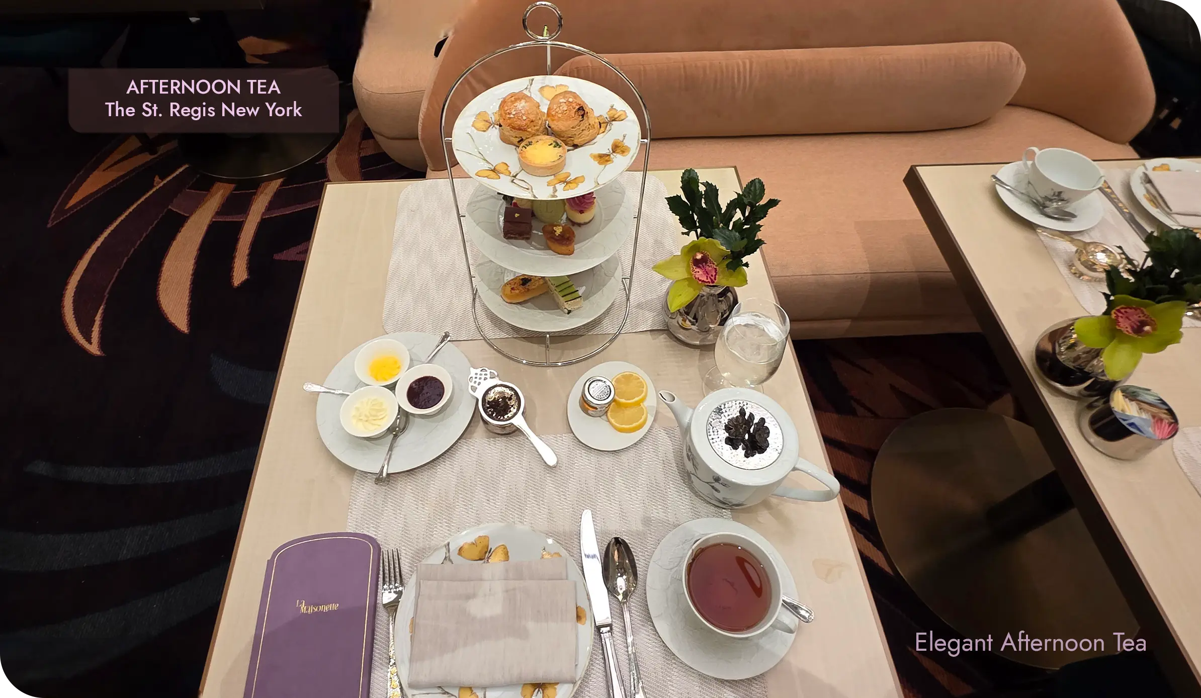 Afternoon tea table setting at The St. Regis New York in La Maisonette, with tiered stand and teapot