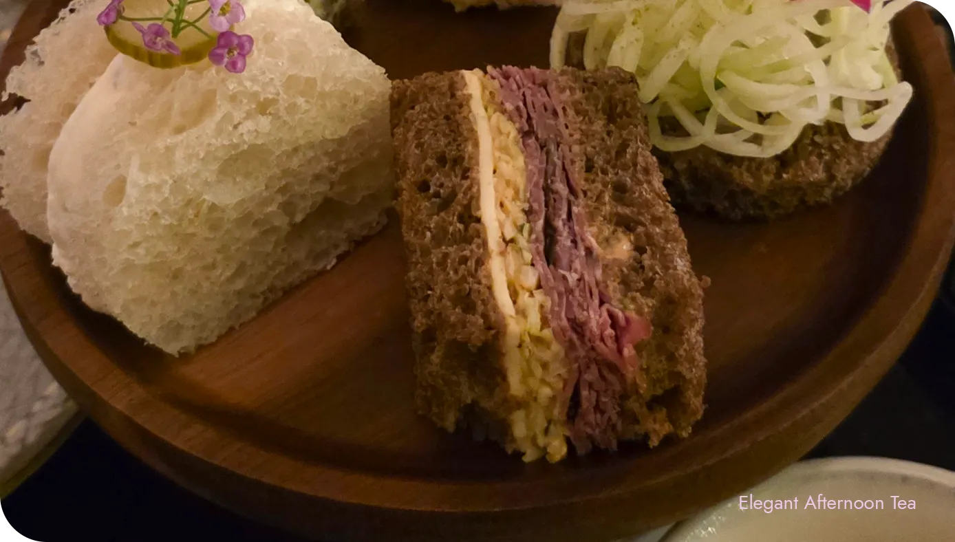 Wagyu Pastrami prepared with 1000 island, Shaved Cabbage, Havarti Cheese served at Yoshoku