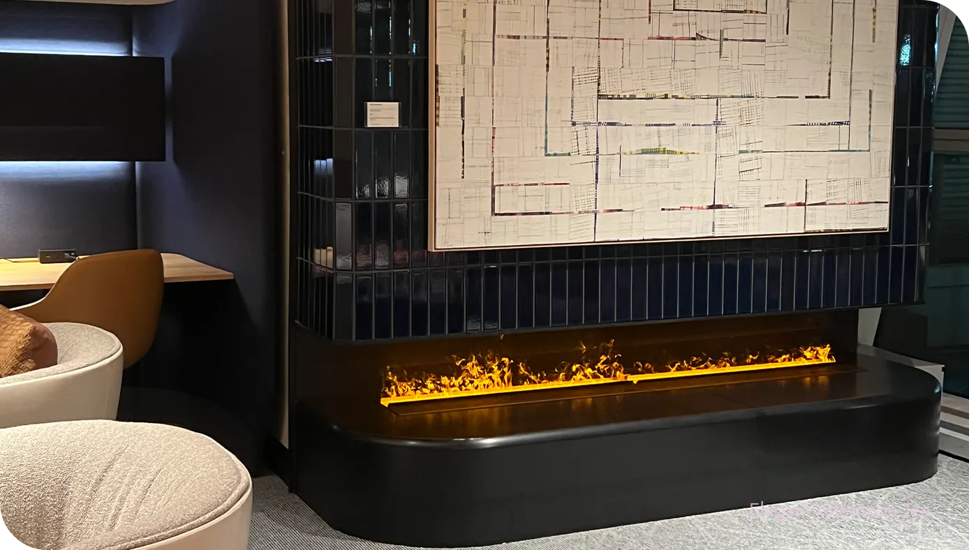 Modern linear fireplace beneath a large abstract artwork in an airport lounge.