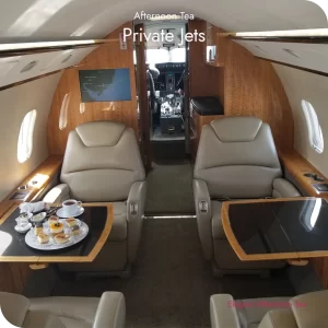 Afternoon tea served aboard a private jet with curated bites arranged for in-flight dining.